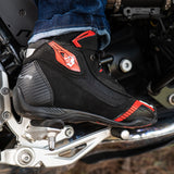 model shoot bela kiva man touring boot black and red side view